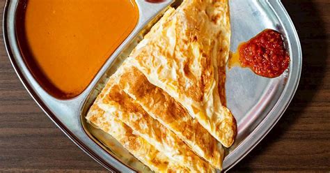 Roti Telur In Mamak Restaurant | TasteAtlas | Recommended authentic ...