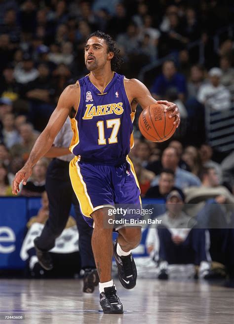 Guard Rick Fox of the Los Angeles Lakers dribbles the ball during the ...