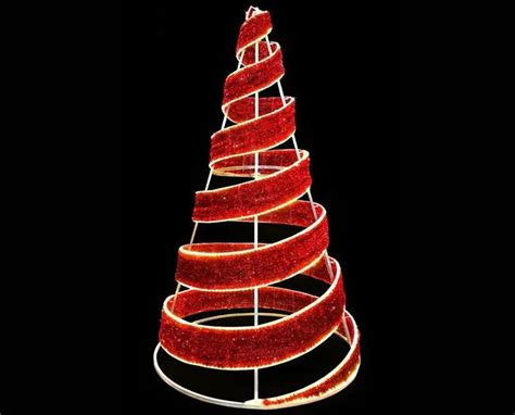 A Lighted Christmas Tree With Red Ribbons On It S Sides And Lights In