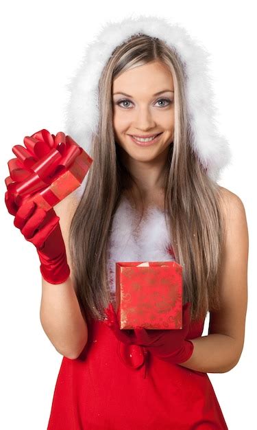 Premium Photo Beautiful Blonde Woman In Santa Hat With Gift