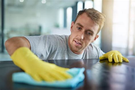 Man With Gloves Office Cleaning Service And Janitor Dusting Dirt For