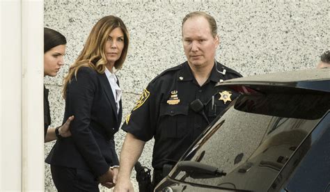 Former Pennsylvania Attorney General Kathleen Kane is escorted from ...