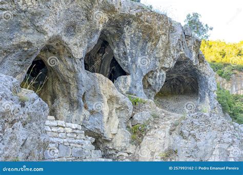 Holes Caves In The Stone Slopes In The Hot Spring Zone Of Permet Albania Stock Photo Image