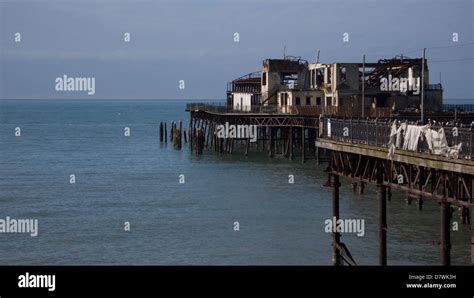 Derelict Burnt Out Pier Hastings Uk Stock Photo Alamy