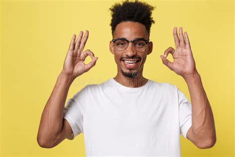 Portrait Of Happy African American Man Showing Ok Sign And Smiling