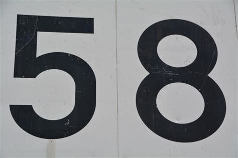 Premium Photo | Close-up of number 58 on wall