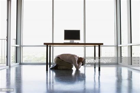 46 Businessman Hiding Under Desk Stock Photos High Res Pictures And