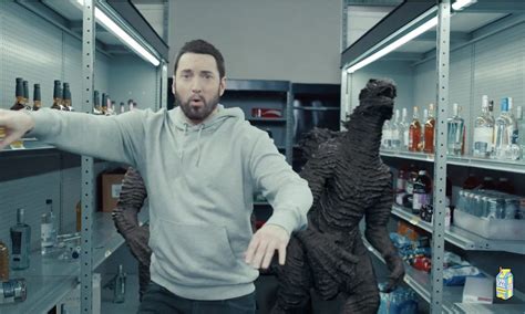 Eminem Pays Tribute To Juice Wrld In Surreal ‘Godzilla’ Video | uDiscover