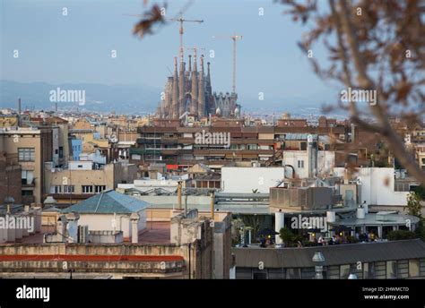 Barcelona roofs against background of Sagrada Familia Stock Photo - Alamy