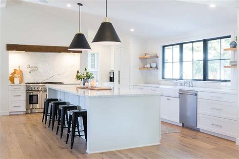 Black Tolix Stools At White Kitchen Island Transitional Kitchen