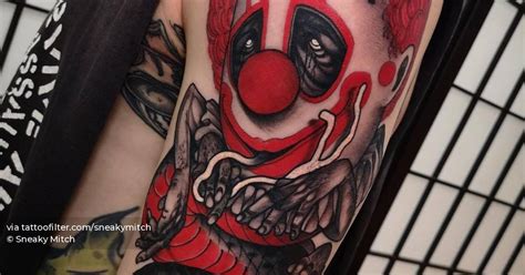 Evil Clown Tattoo Located On The Upper Arm