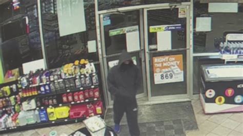 Police Search For Suspect In Robberies At 2 Manchester Gas Stations