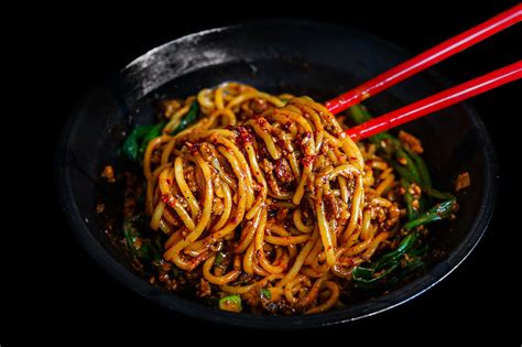 Dan Dan Mian as known as Dan Dan Noodles is signature Sichuan street ...