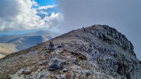 Rock Formations On Mystical Foggy Hiking Trail Leading To Mount Olympus