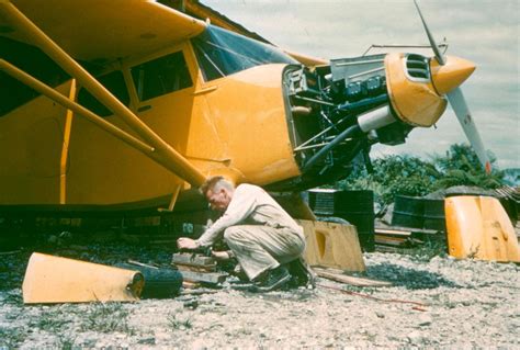 Nate Saint fixing his plane in the water! | Historical photos, Walk the ...