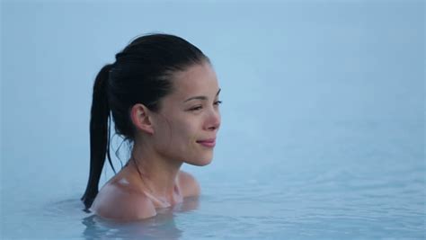 Geothermal Spa Woman Relaxing In Hot Spring Pool On Iceland Girl Enjoying Bathing In A Blue