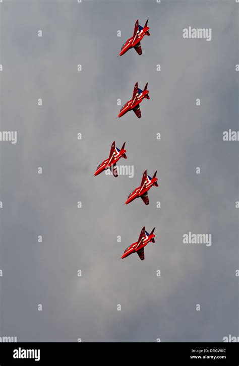 Five Red Arrows in Formation Stock Photo - Alamy