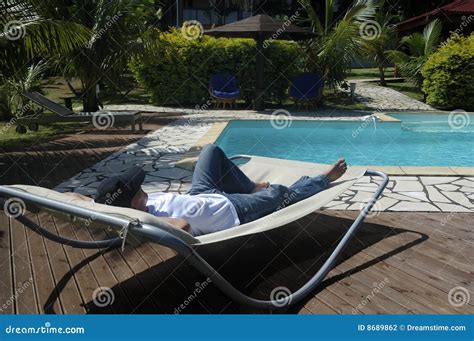 Relax at swimming pool stock photo. Image of tropical - 8689862