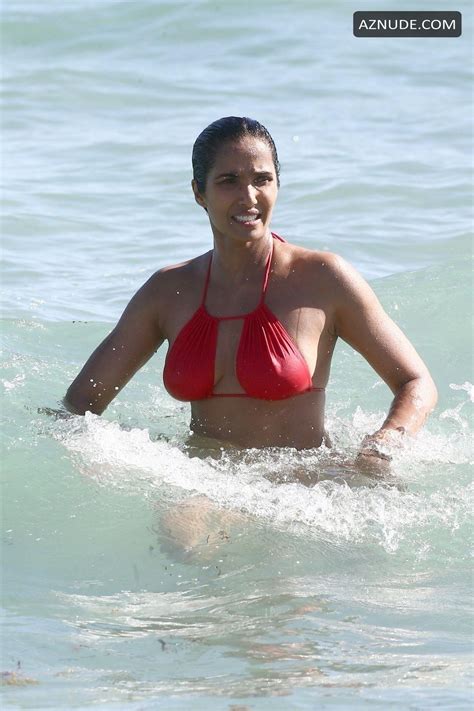 Padma Lakshmi Sexy In A Revealing Red Bikini While Going For A Dip On Miami Beach Aznude