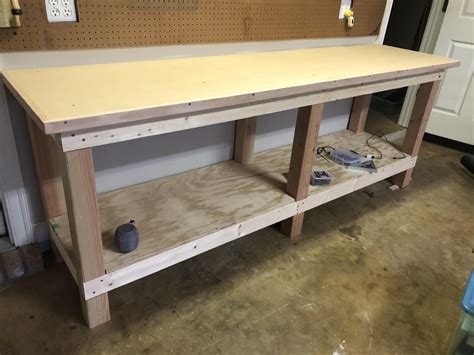 My first workbench! Top is 3/4 plywood and 3/4 mdf, red oak trim, 8ft ...