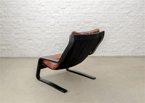 Mid Century Modern Design Bouncy Maroon Leather Lounge Chair