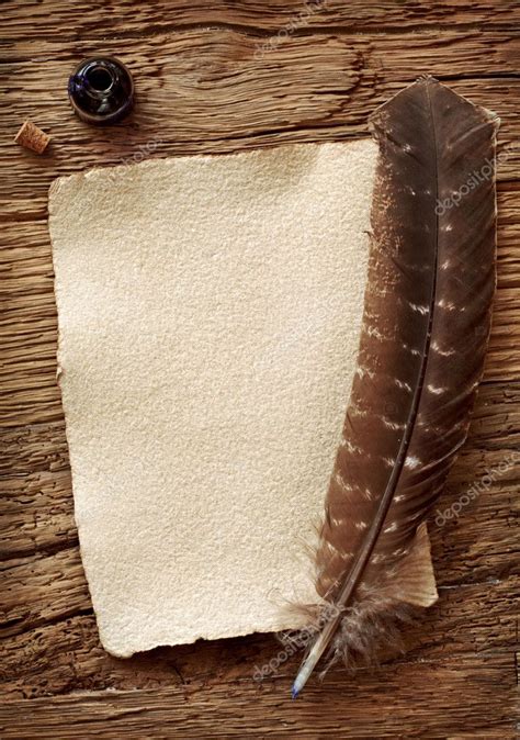 Old parchment and quill pen Stock Photo by ©Elena Schweitzer 7969416