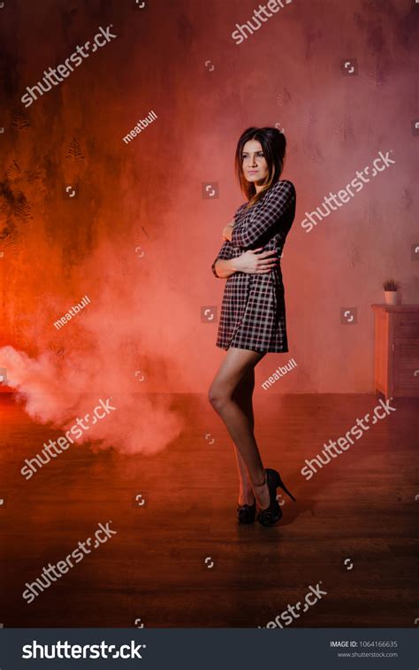 Sexy Slender Brunette Posing Cloud Orange Stock Photo 1064166635 Shutterstock