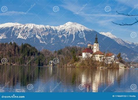 Lake Bled Against Snowy Mountain Peaks Stock Image - Image of alpine ...