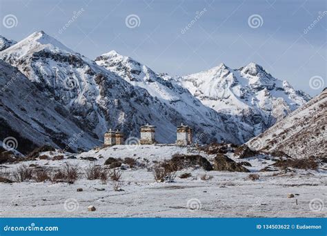 Bhuddist Stupas in Snowy Himalayan Mountains, Bhutan Stock Photo ...