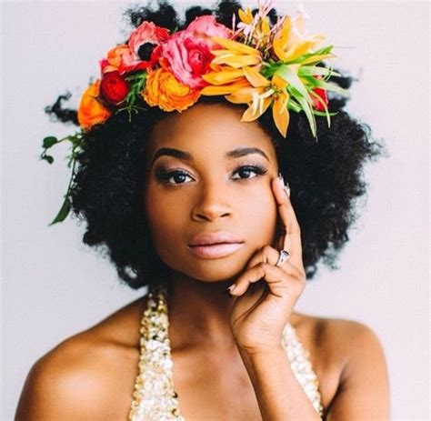 Simple And Stunning Ways To Wear Flowers In Your Hair Natural Hair Styles Curly Hair Styles