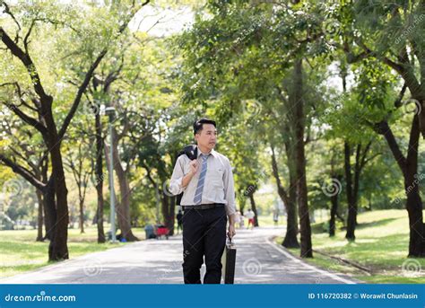 Young Asia Businessman Showing Stress Face He Was Walking In Th Stock