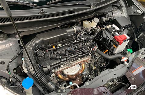 suzuki ertiga hybrid engine tech  versatility   affordable
