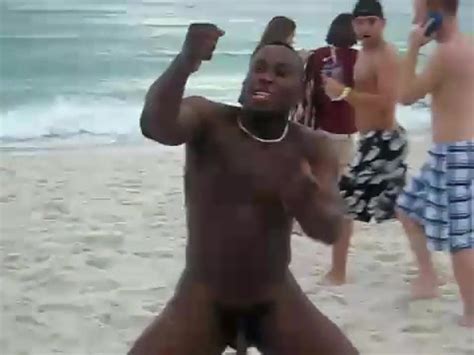 Naked Black Stud Bouncing His Big Cock Up And Down On The Beach ThisVid