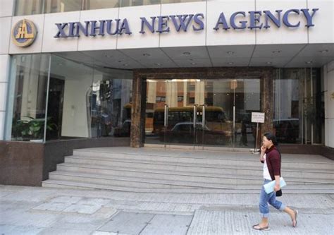 China's Xinhua plans to list website: report