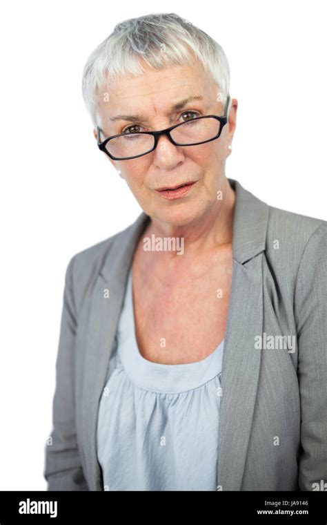 Serious Mature Woman Wearing Glasses On White Background Stock Photo