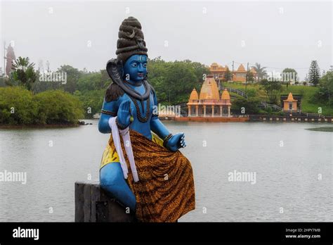 Statue of Shiva in a Hindu temple in Ganga Talao crater lake (Grand ...