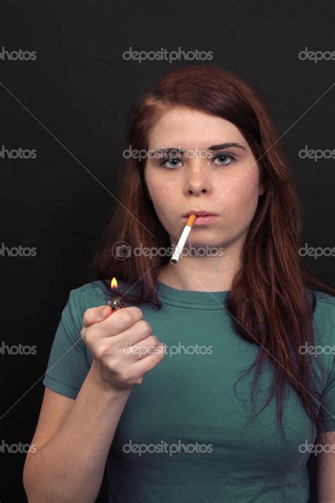 Beautiful Brunette Holding A Cigarette 4 Stock Photo Csproductions 17622699