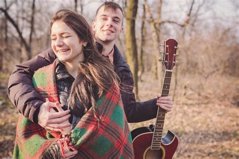 Premium Photo Beautiful Young Couple Enjoying Outdoor