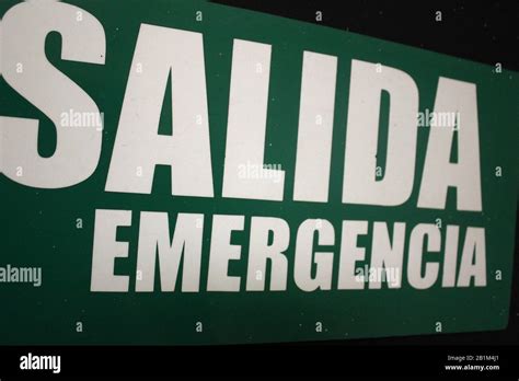 Green emergency exit sign Stock Photo - Alamy