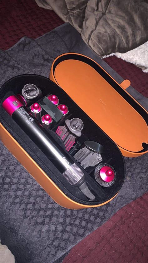 Dyson hair dryer and hair curler for sale : r/Dysonairwrap