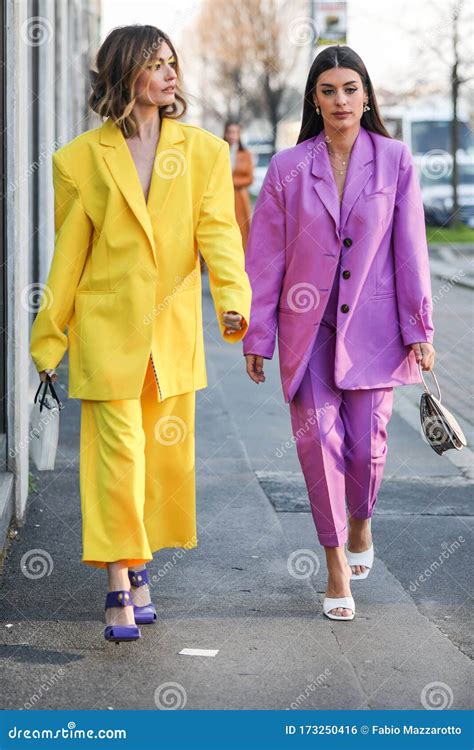 Models Wear a Purple and a Yellow Suit during the Gucci Fashion Show at ...