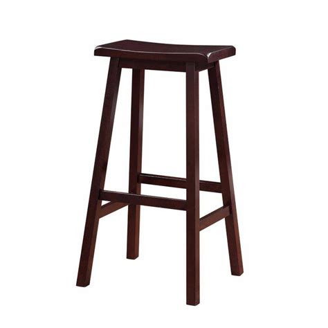 Benjara In Brown Backless Wooden Frame Saddle Stool With Slanted