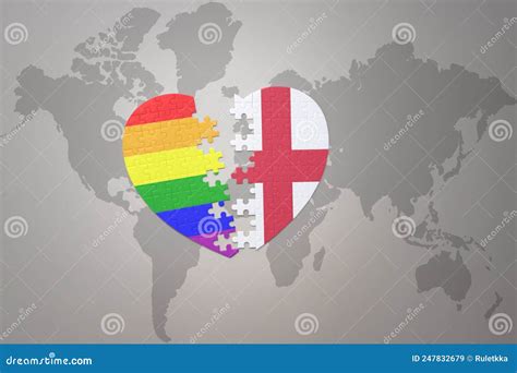 Puzzle Heart With The Rainbow Gay Flag And England On A World Map