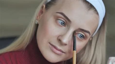 Blonde Girl Does Her Own Eye Makeup Stock Video Pond