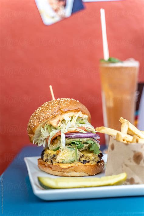 Cheeseburger And French Fries By Stocksy Contributor J Anthony