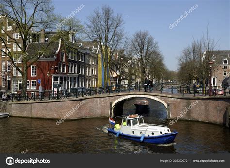 Canal Bridge Amsterdam – Stock Editorial Photo © PantherMediaSeller ...