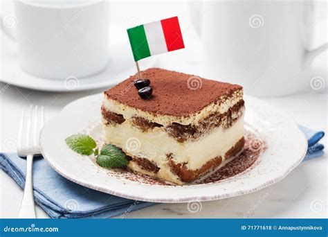 Tiramisu, Traditional Italian Dessert on a White Plate with Italian ...