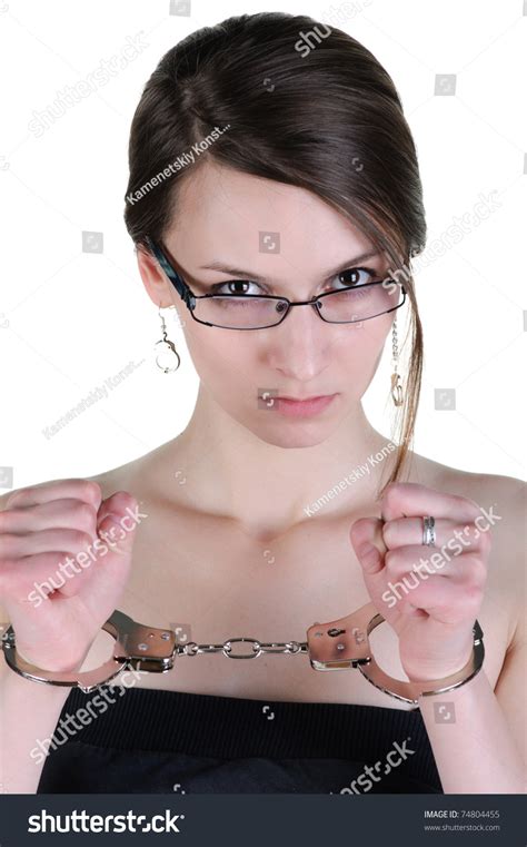 Beautiful Woman In Handcuffs Isolated Over White Stock Photo