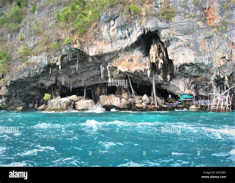 An inhabited cave in Thailand at the waterside near by the Phi Phi ...