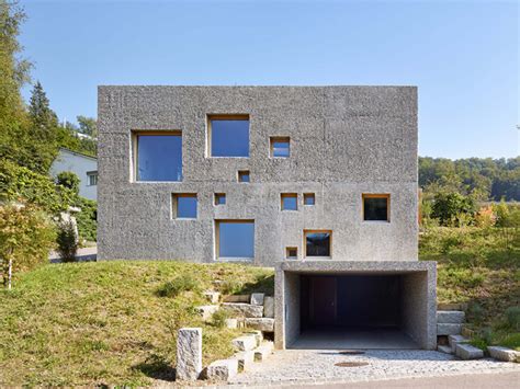 Modern Concrete House Puntured With Square Windows - DigsDigs